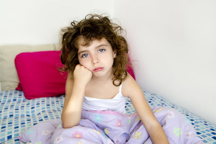 How do you stop children from wetting the bed?
